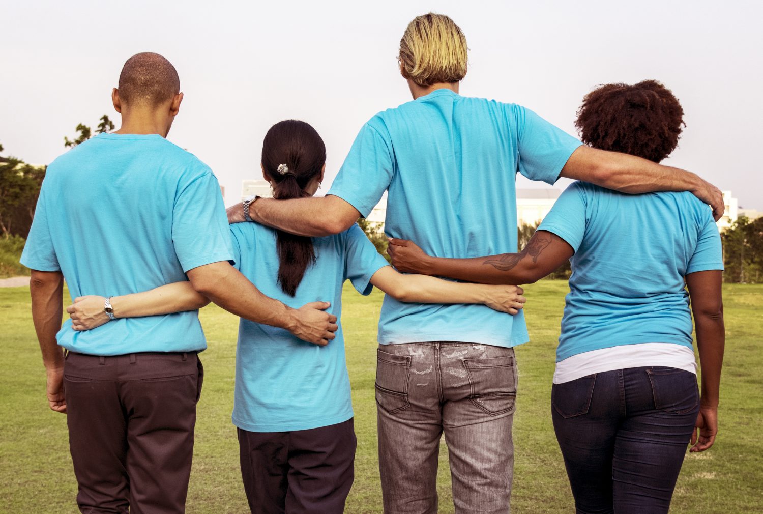 Group of happy and diverse volunteers